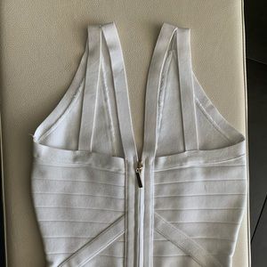 Marciano bandage dress with gold zipper accent.